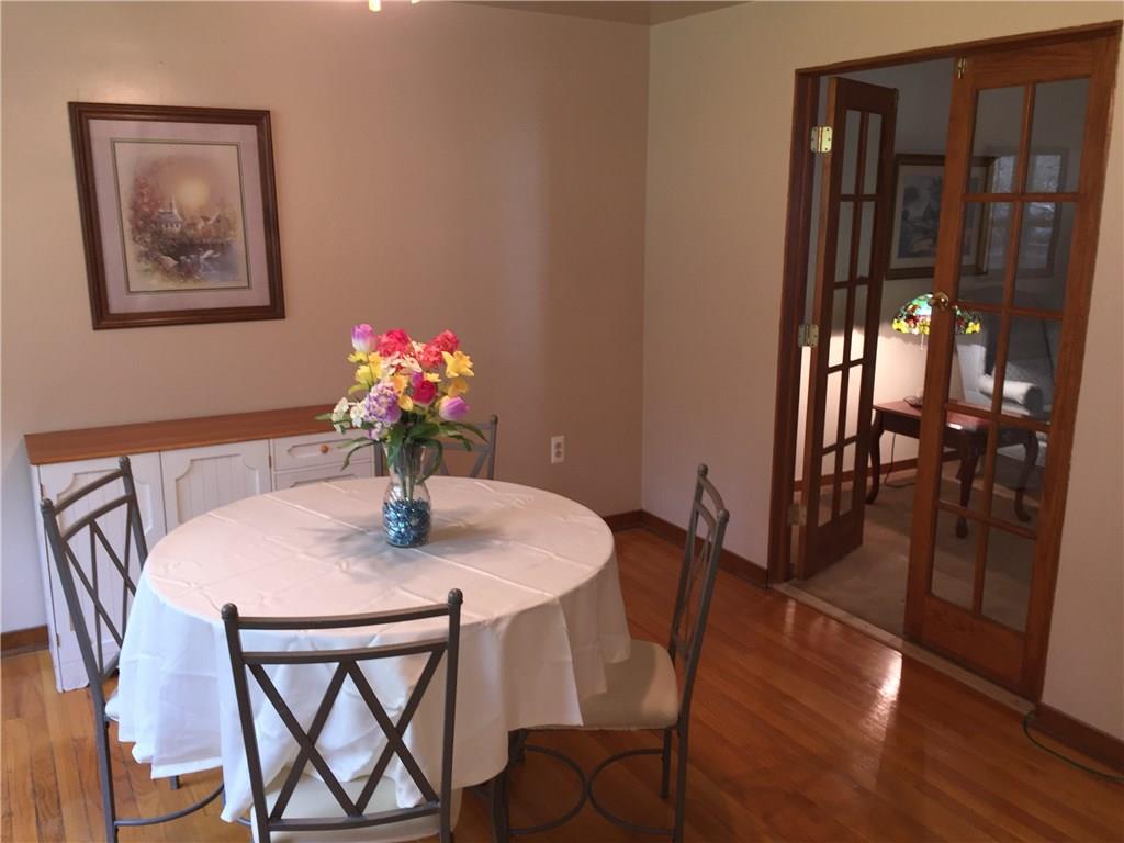 177 McIntyre Road Pittsburgh, PA 15237 - Photo 4 of 10 Dining can be private from the living room with the French doors. Nice hardwood floors that are exposed. Wood floors are under all carpets on the main and second floor.