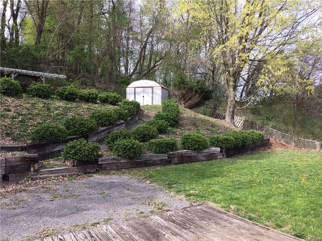 177 McIntyre Road Pittsburgh, PA 15237 - Photo 8 of 10 Easy access with the path lined with greenery.