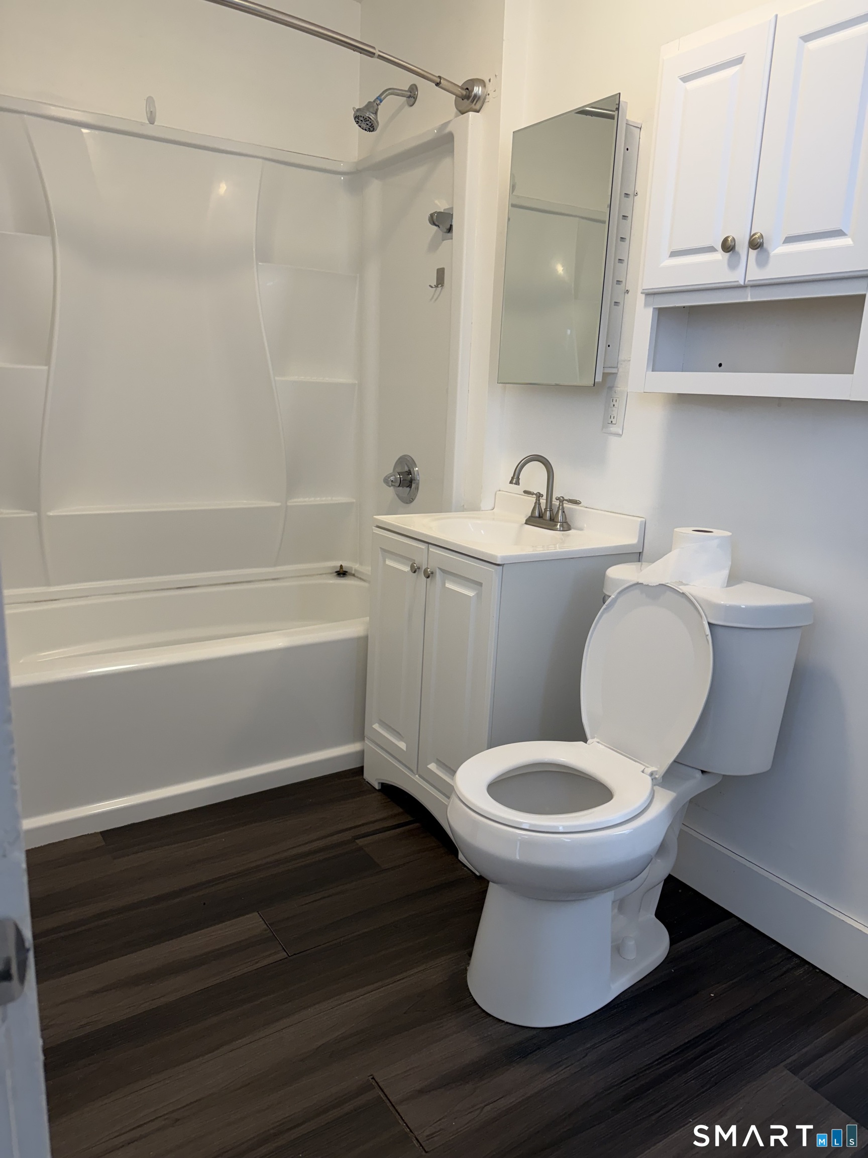 31 Winthrop Street Meriden, CT 06451 - Photo 8 of 8 a bathroom with a sink toilet and shower