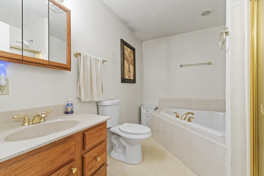 72 Ida Lane Fall River, MA 02720 - Photo 21 of 28 a bathroom with a sink a toilet and a bathtub