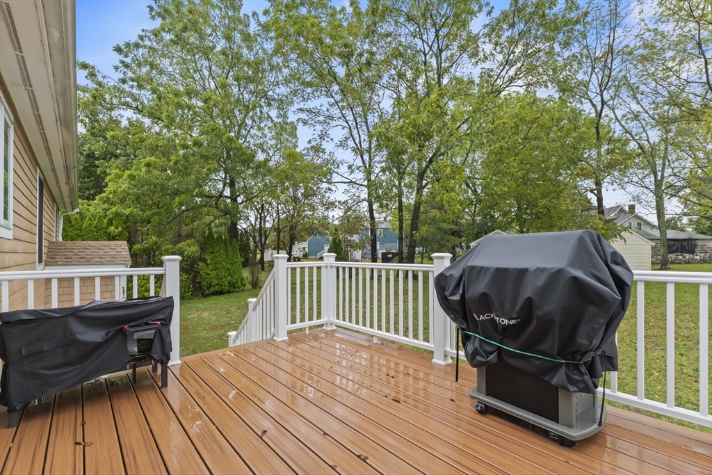 72 Ida Lane Fall River, MA 02720 - Photo 25 of 28 a view of backyard with deck and outdoor seating