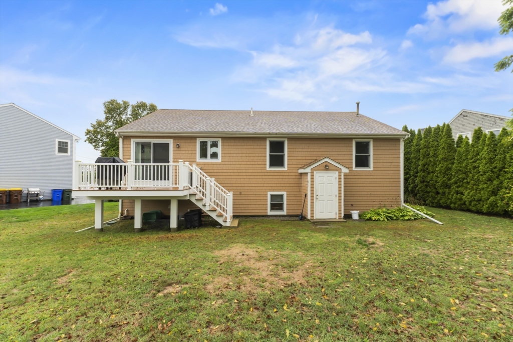 72 Ida Lane Fall River, MA 02720 - Photo 26 of 28 a view of a house with a yard and sitting area