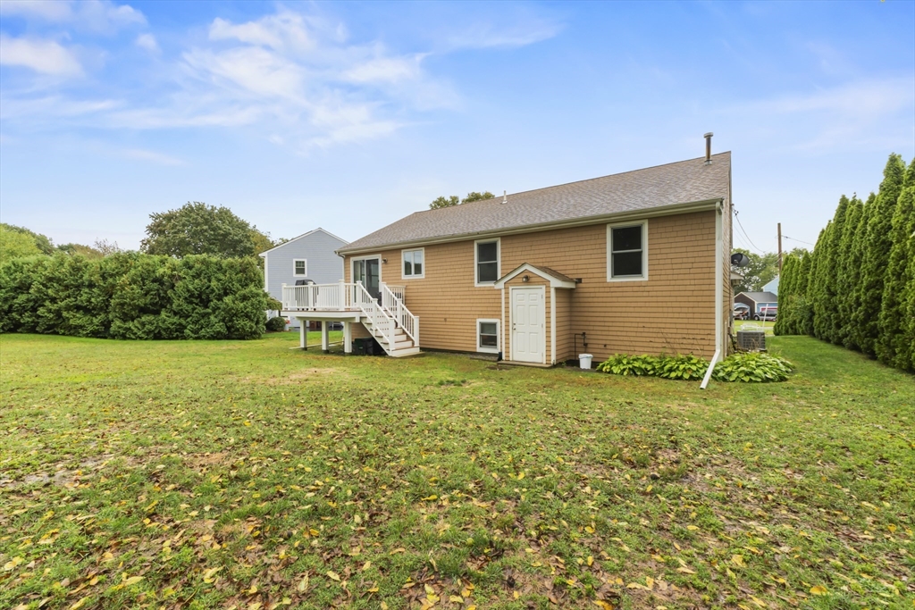 72 Ida Lane Fall River, MA 02720 - Photo 27 of 28 a view of a house with backyard and garden
