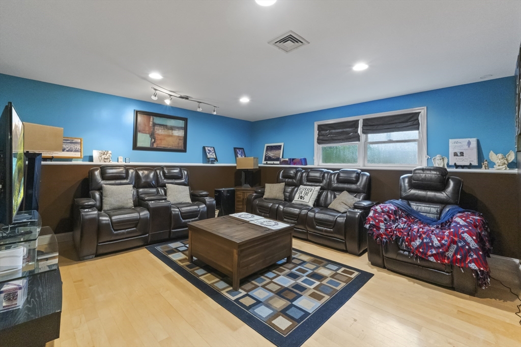 72 Ida Lane Fall River, MA 02720 - Photo 9 of 28 a living room with furniture and a flat screen tv