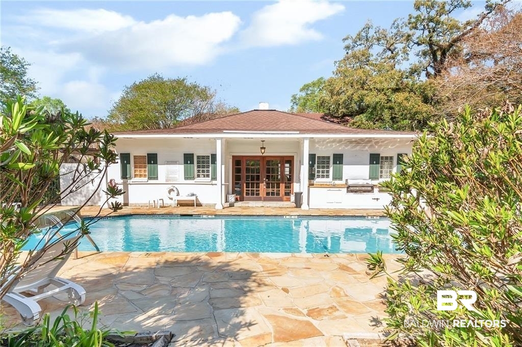 214 Upham Street, Unit 3D Mobile, AL 36607 - Photo 25 of 34 Swimming pool featuring french doors, a patio, and a grill