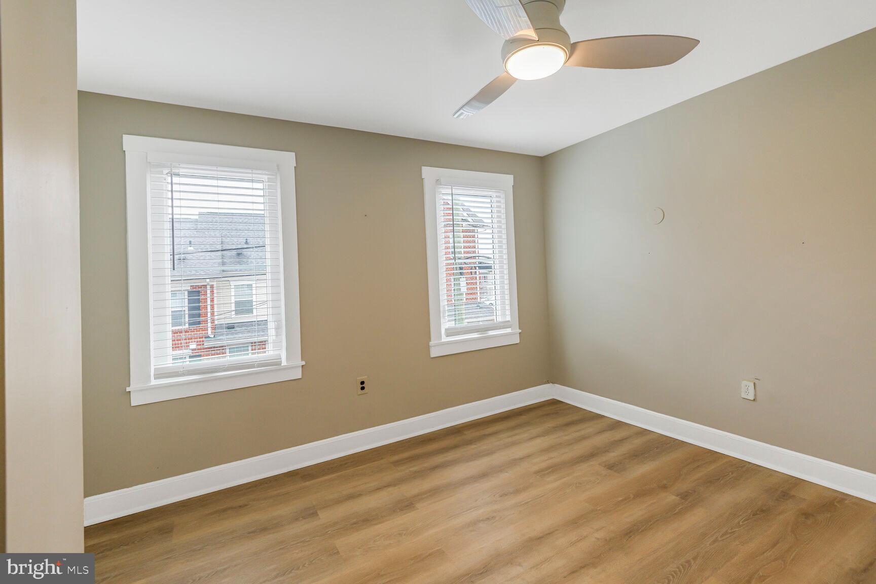 38 Pleasant Street Annapolis, MD 21401 - Photo 11 of 22 a view of an empty room with wooden floor and a window