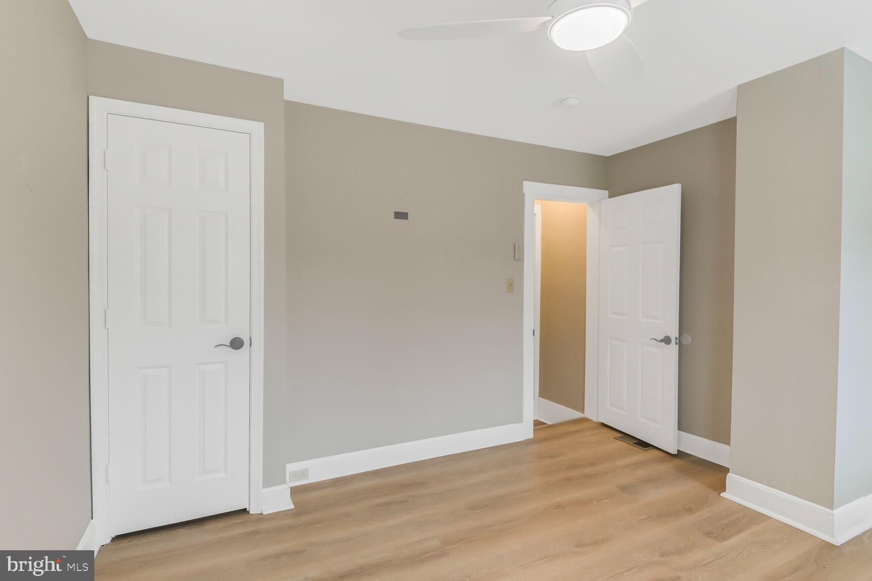 38 Pleasant Street Annapolis, MD 21401 - Photo 13 of 22 a view of an empty room with wooden floor