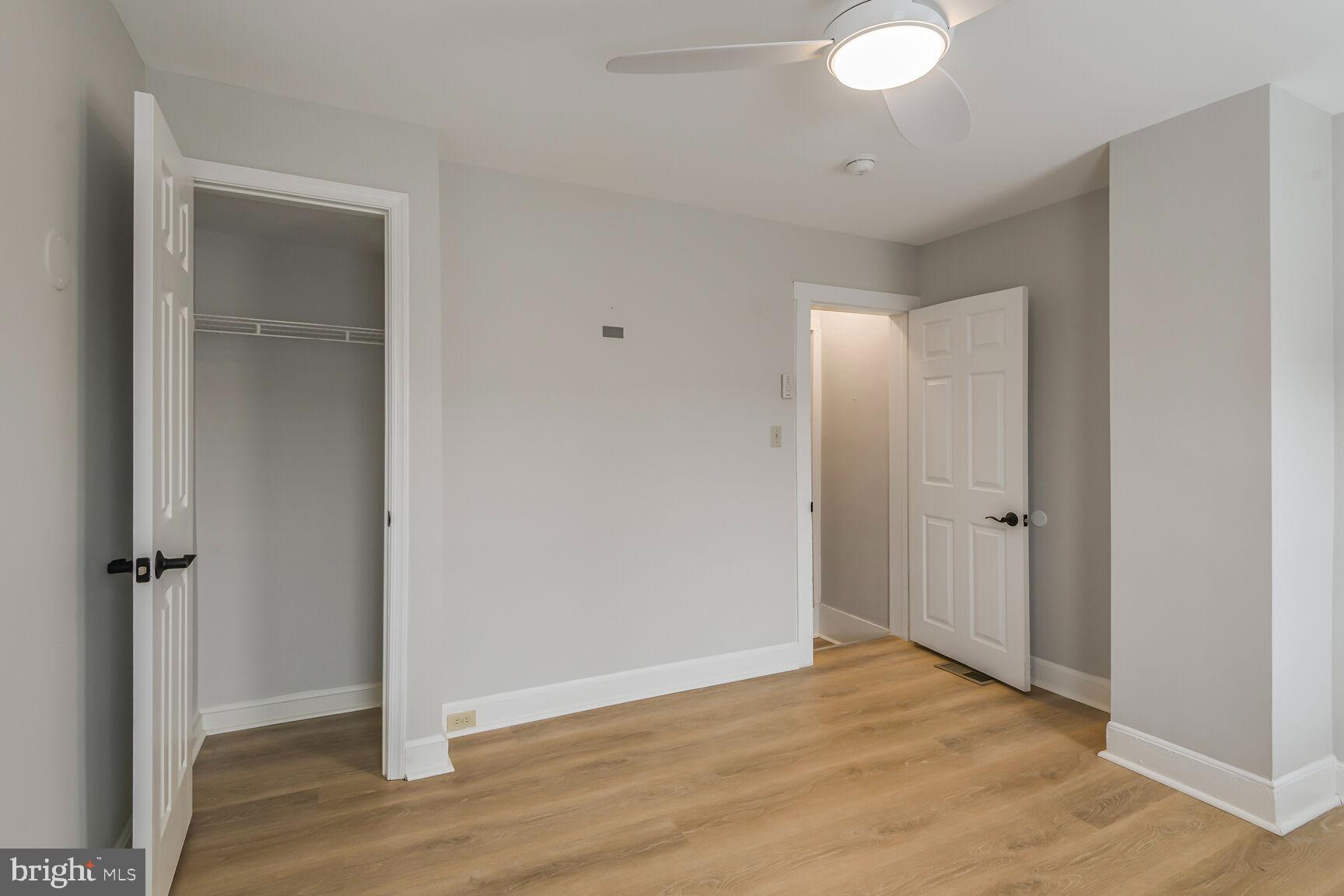 38 Pleasant Street Annapolis, MD 21401 - Photo 14 of 22 an empty room with wooden floor and closet