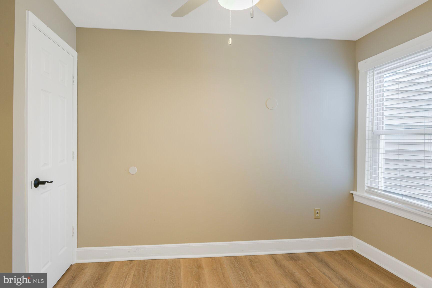 38 Pleasant Street Annapolis, MD 21401 - Photo 16 of 22 a view of a room with wooden floor and small window
