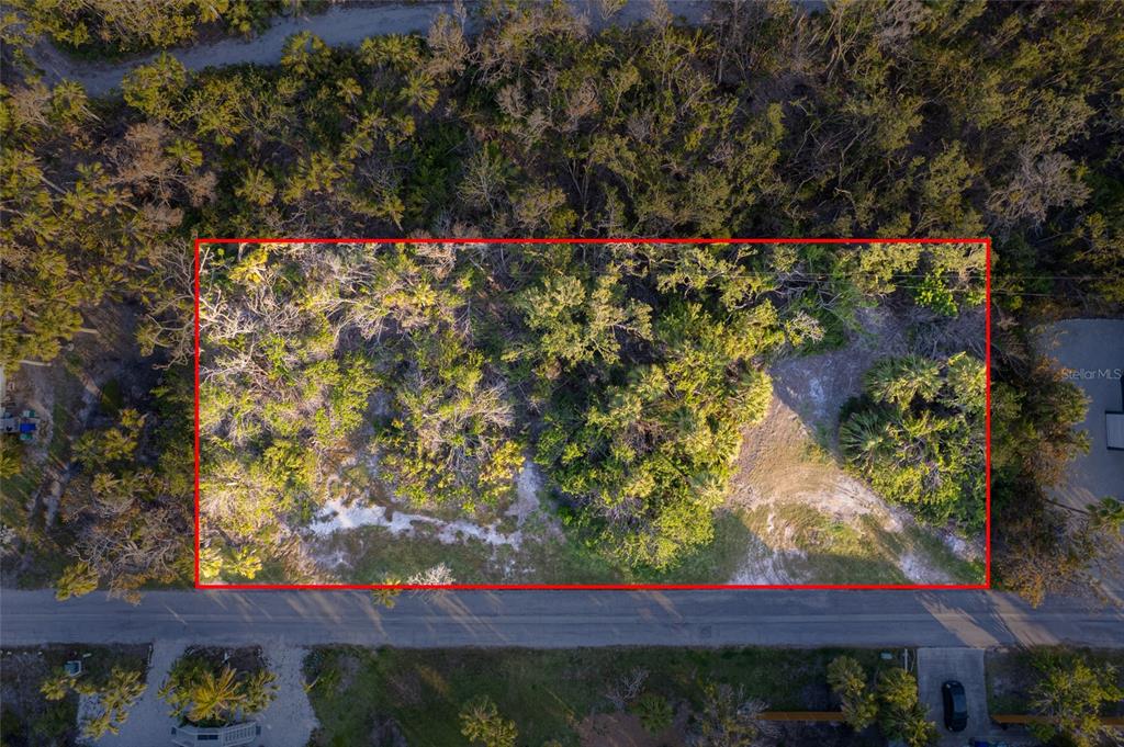 560 Gulf Bay Road Longboat Key, FL 34228 - Photo 19 of 38 an outdoor view of garden