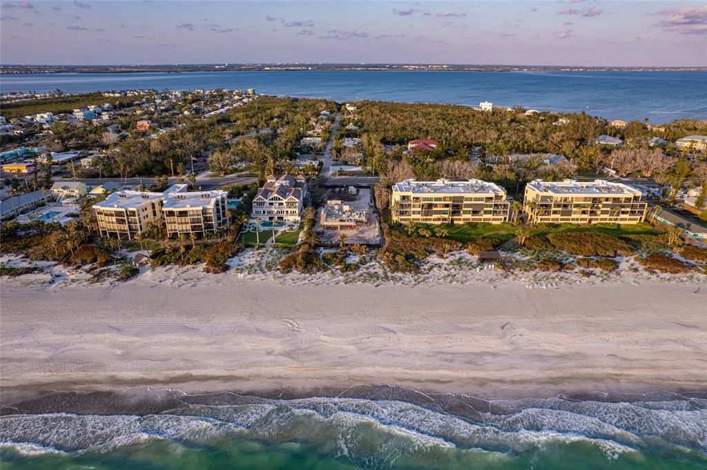 560 Gulf Bay Road Longboat Key, FL 34228 - Photo 22 of 38 an aerial view of residential houses with outdoor space