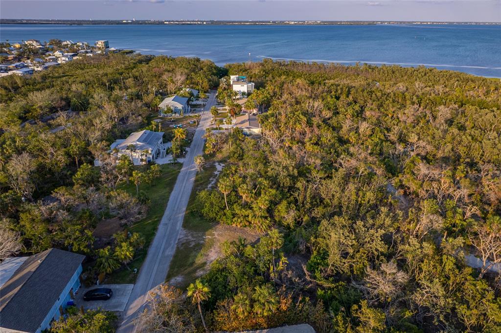 560 Gulf Bay Road Longboat Key, FL 34228 - Photo 25 of 38 a view of a houses with a outdoor space