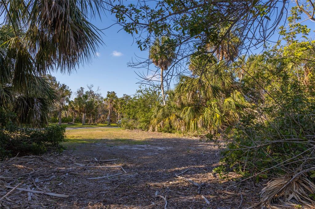 560 Gulf Bay Road Longboat Key, FL 34228 - Photo 7 of 38 a view of ocean view with beach
