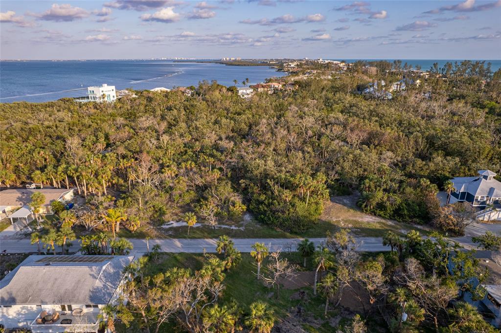 560 Gulf Bay Road Longboat Key, FL 34228 - Photo 10 of 38 a view of a lake