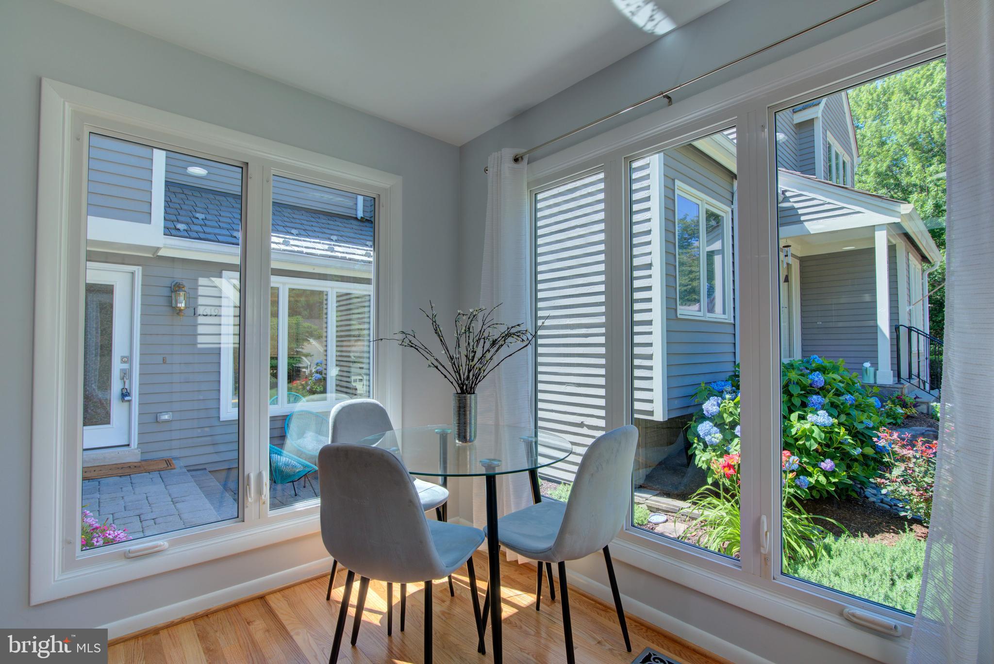 11619 Chapel Cross Way Reston, VA 20194 - Photo 16 of 33 Sunny Breakfast Room with Walls of Glass Views.