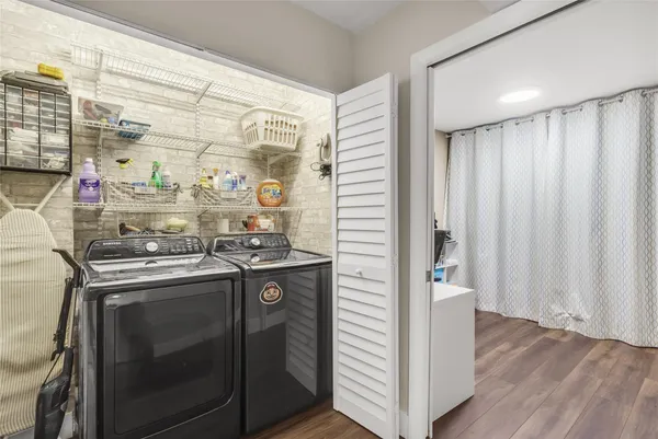 a kitchen with a sink and a refrigerator