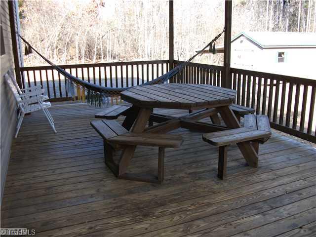 159 Foster Road Mocksville, NC 27028 - Photo 13 of 16 Patio/Deck. Covered rear deck.