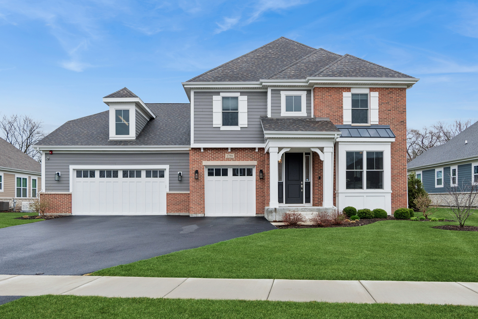 1759 Provenance Way Northbrook, IL 60062 - Photo 1 of 38 a front view of a house with a yard