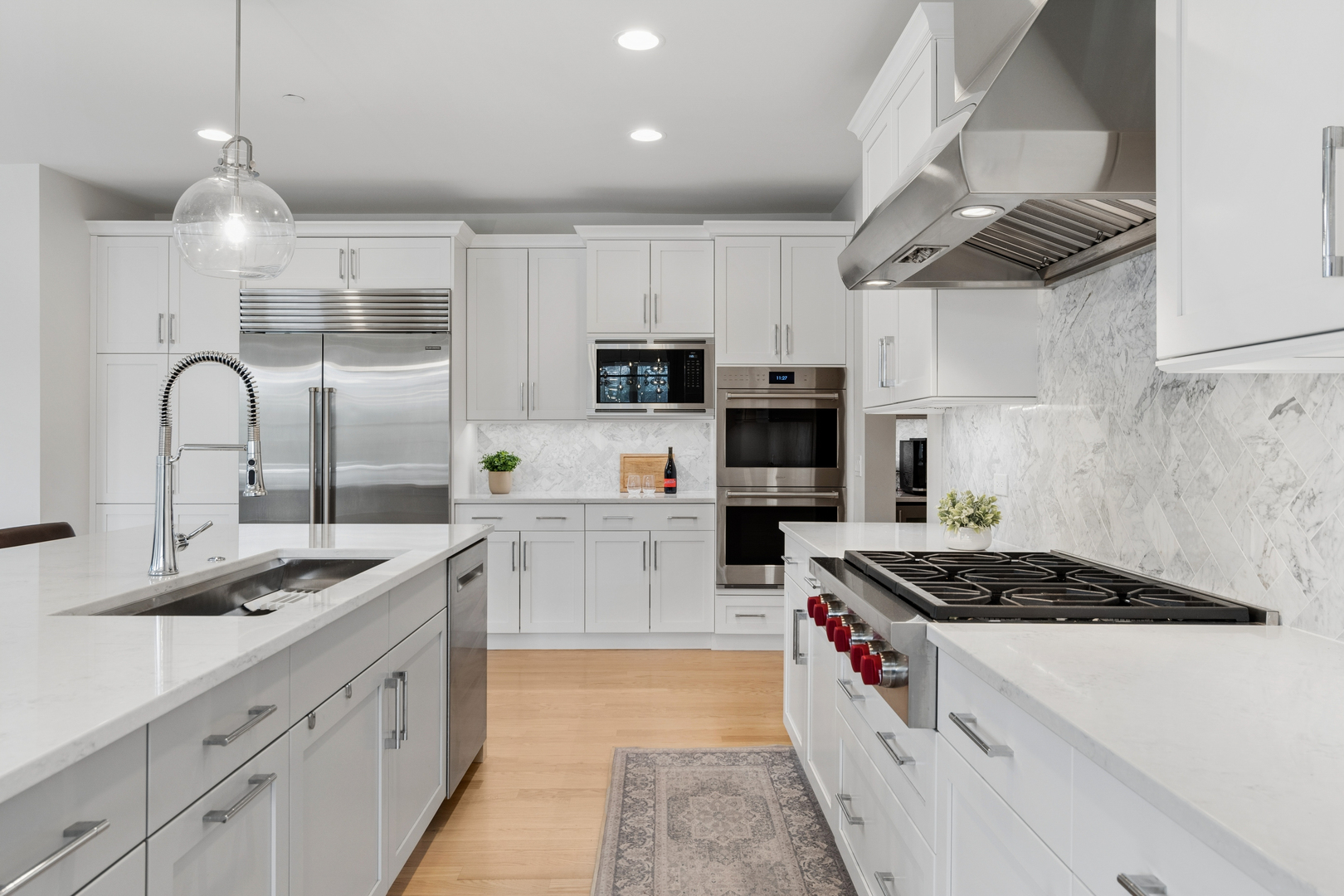 1759 Provenance Way Northbrook, IL 60062 - Photo 13 of 38 a kitchen with kitchen island stainless steel appliances a sink a stove and a counter top space