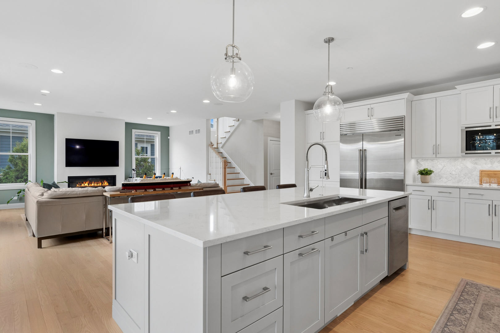 1759 Provenance Way Northbrook, IL 60062 - Photo 9 of 38 a large kitchen with kitchen island a sink stainless steel appliances and center island