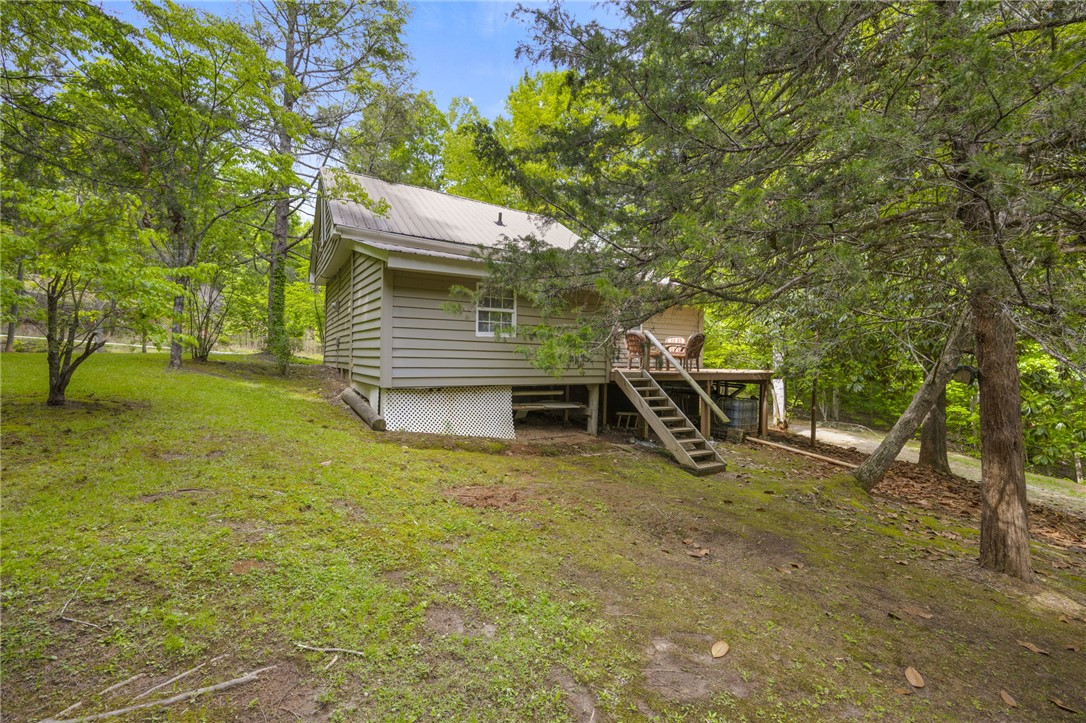 437 West Gate Road Pickens, SC 29671 - Photo 18 of 47 Escape to this charming, secluded woodland retreat, featuring a private deck for outdoor relaxation.