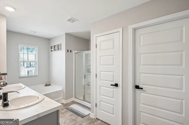 a bathroom with a sink and a tub