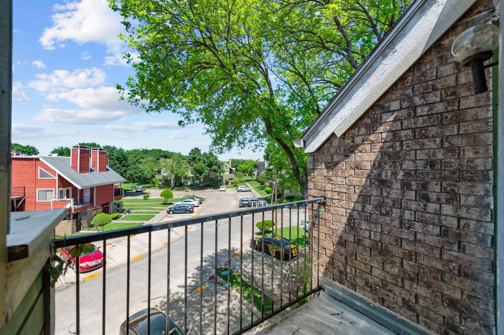 9815 Walnut Street, Unit 204 Dallas, TX 75243 - Photo 19 of 29 a view of a balcony with city view