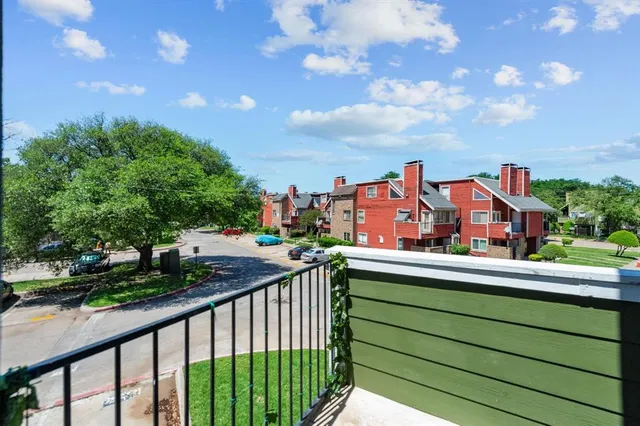 a view of city from a balcony