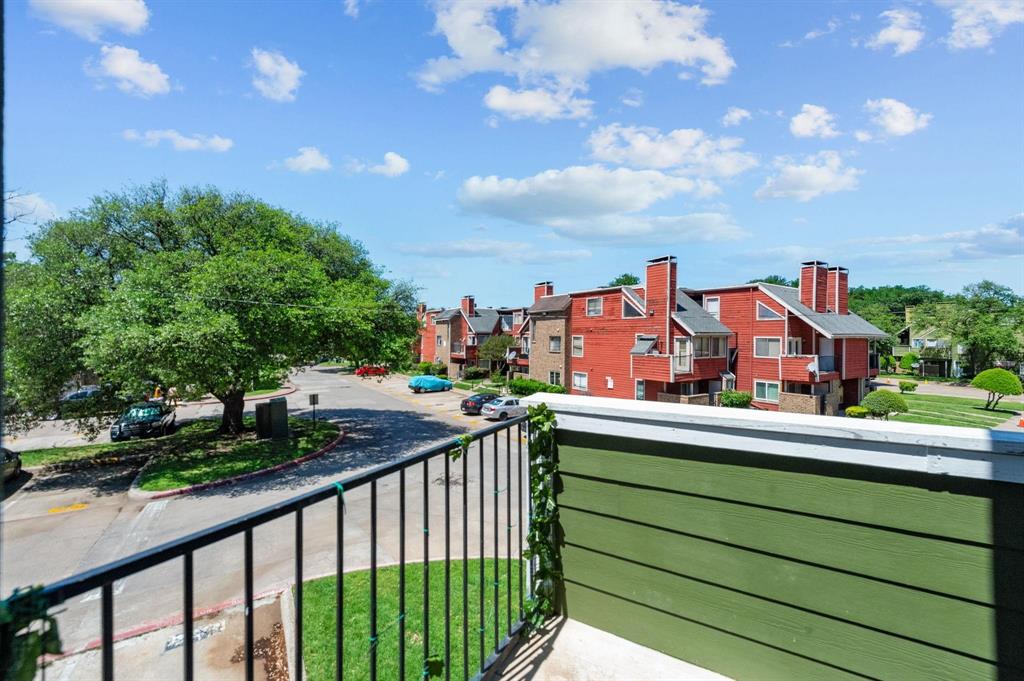 9815 Walnut Street, Unit 204 Dallas, TX 75243 - Photo 25 of 29 a view of city from a balcony