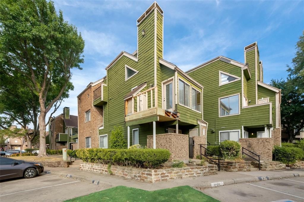 9815 Walnut Street, Unit 204 Dallas, TX 75243 - Photo 29 of 29 a front view of a building with garden