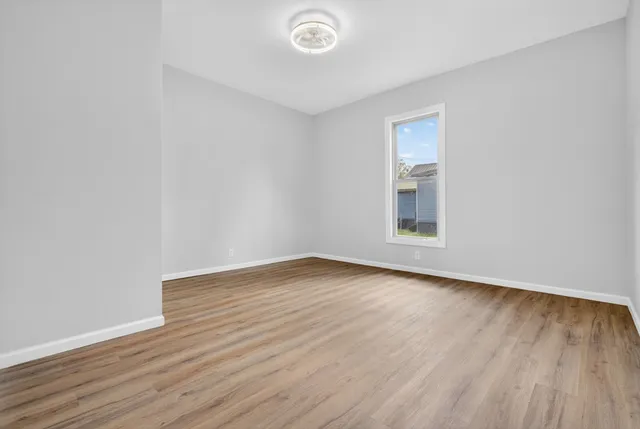 a bathroom with a sink a shower and a mirror