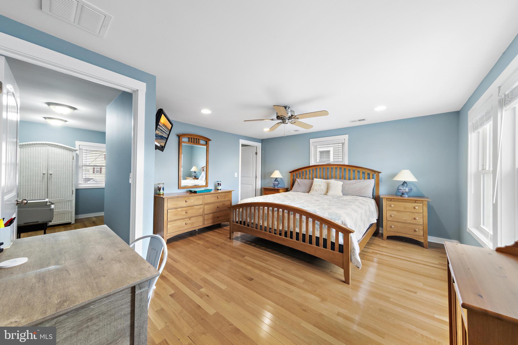 304 Morris Boulevard Manahawkin, NJ 08050 - Photo 18 of 55 a spacious bedroom with a bed and a dresser