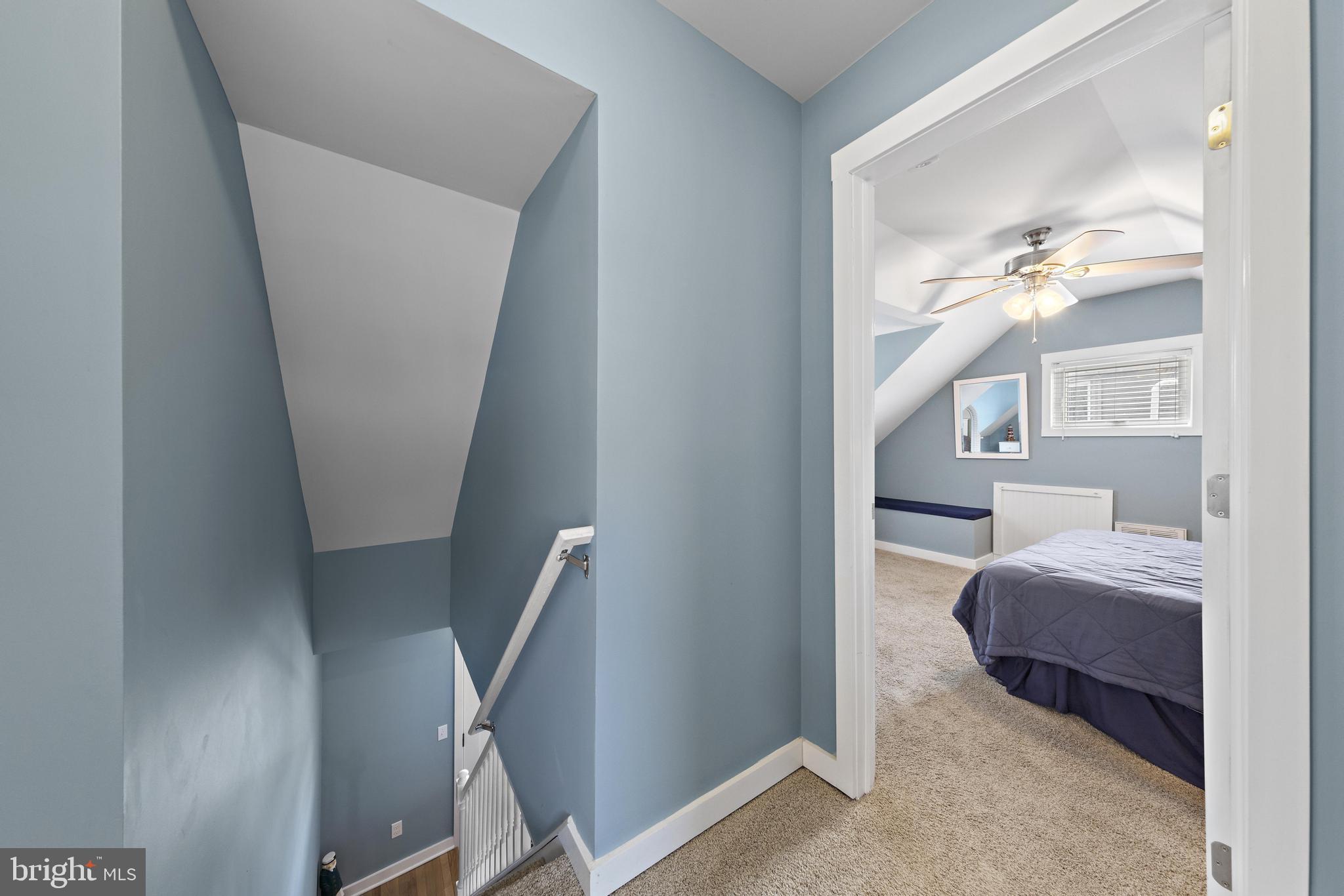 304 Morris Boulevard Manahawkin, NJ 08050 - Photo 29 of 55 a living room with furniture and a chandelier