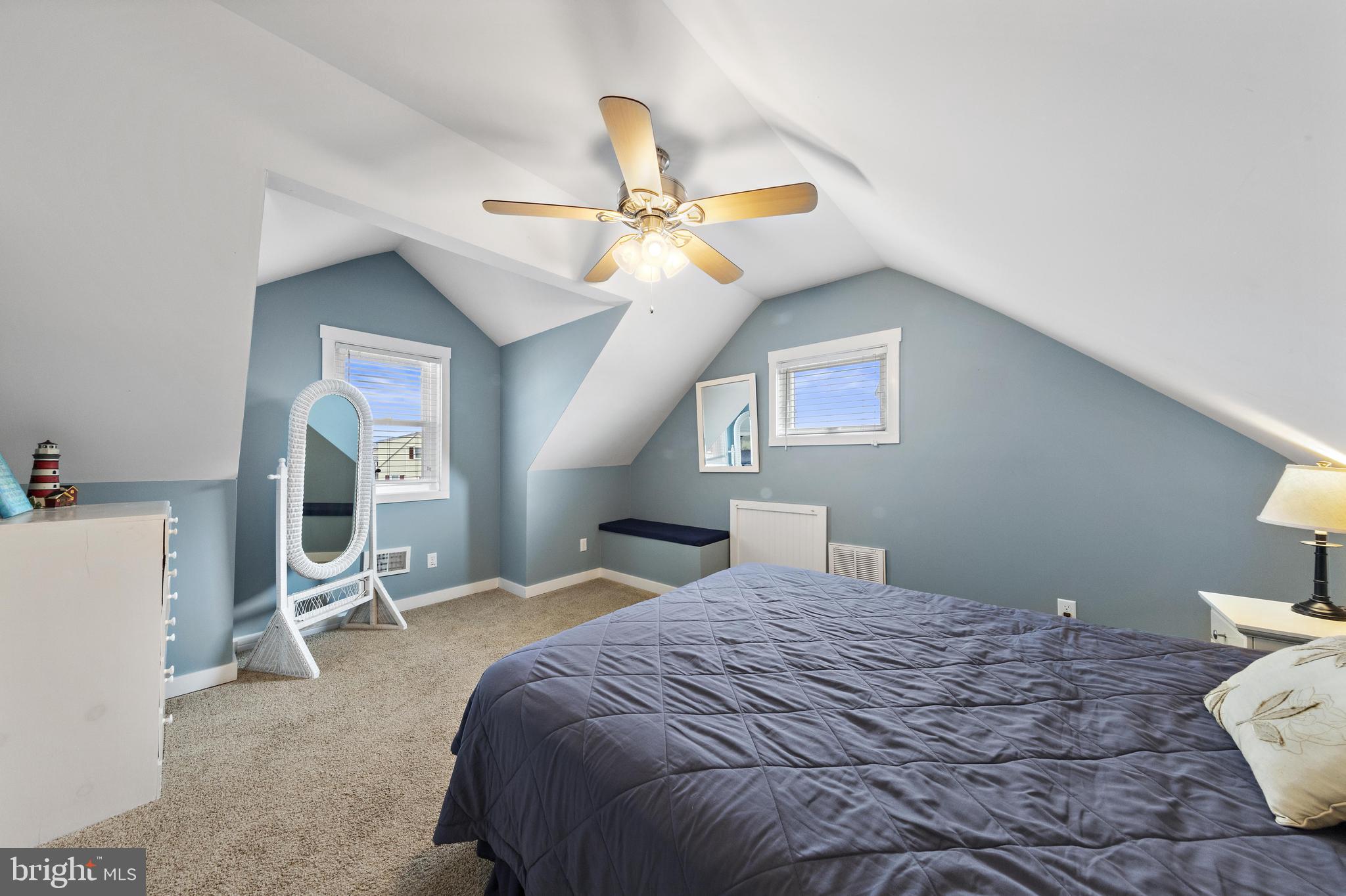 304 Morris Boulevard Manahawkin, NJ 08050 - Photo 31 of 55 a bedroom with a bed gym equipment and a window