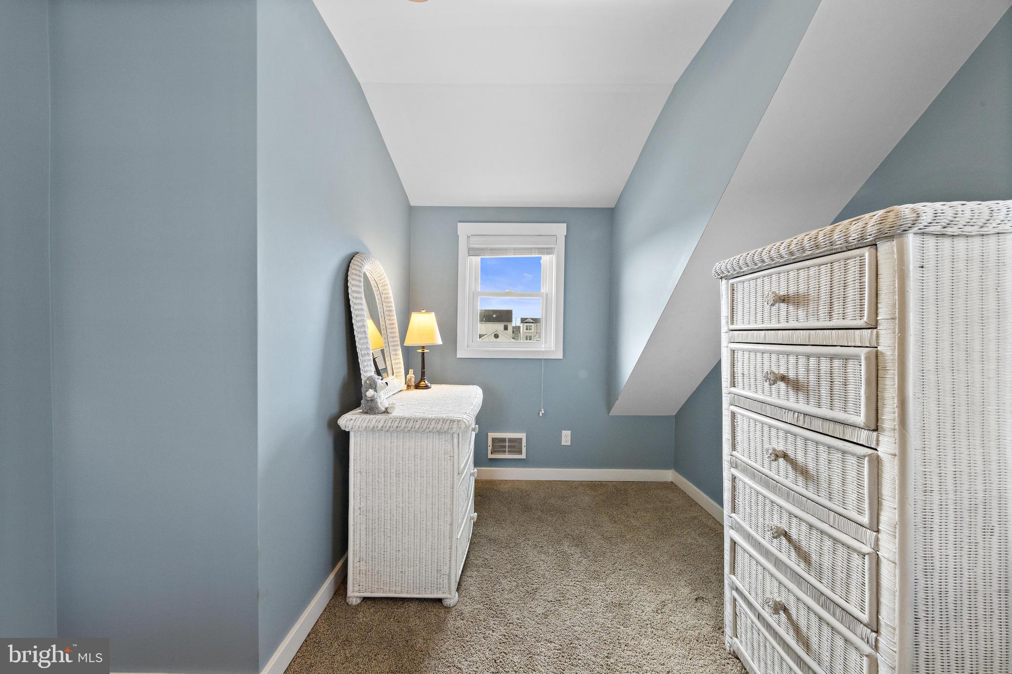 304 Morris Boulevard Manahawkin, NJ 08050 - Photo 34 of 55 Charming attic retreat with serene hues.
