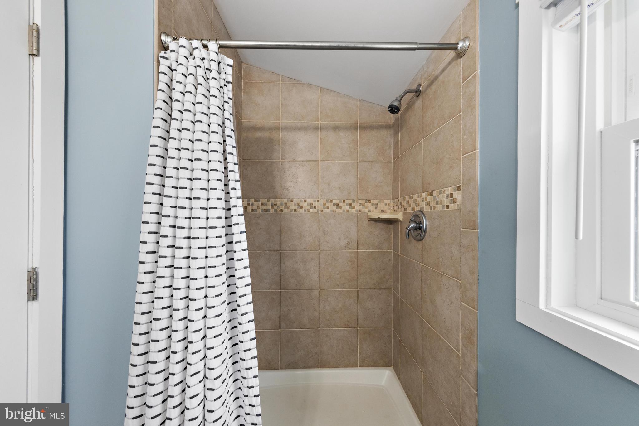 304 Morris Boulevard Manahawkin, NJ 08050 - Photo 36 of 55 a bathroom with a shower
