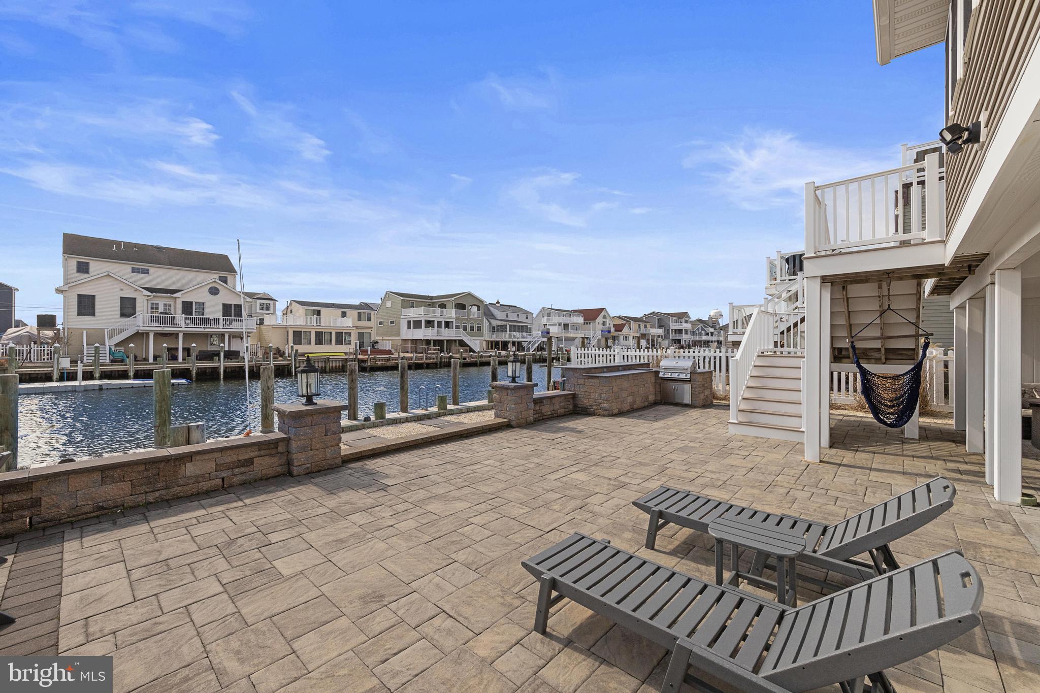 304 Morris Boulevard Manahawkin, NJ 08050 - Photo 46 of 55 a view of a roof deck with couches and city view