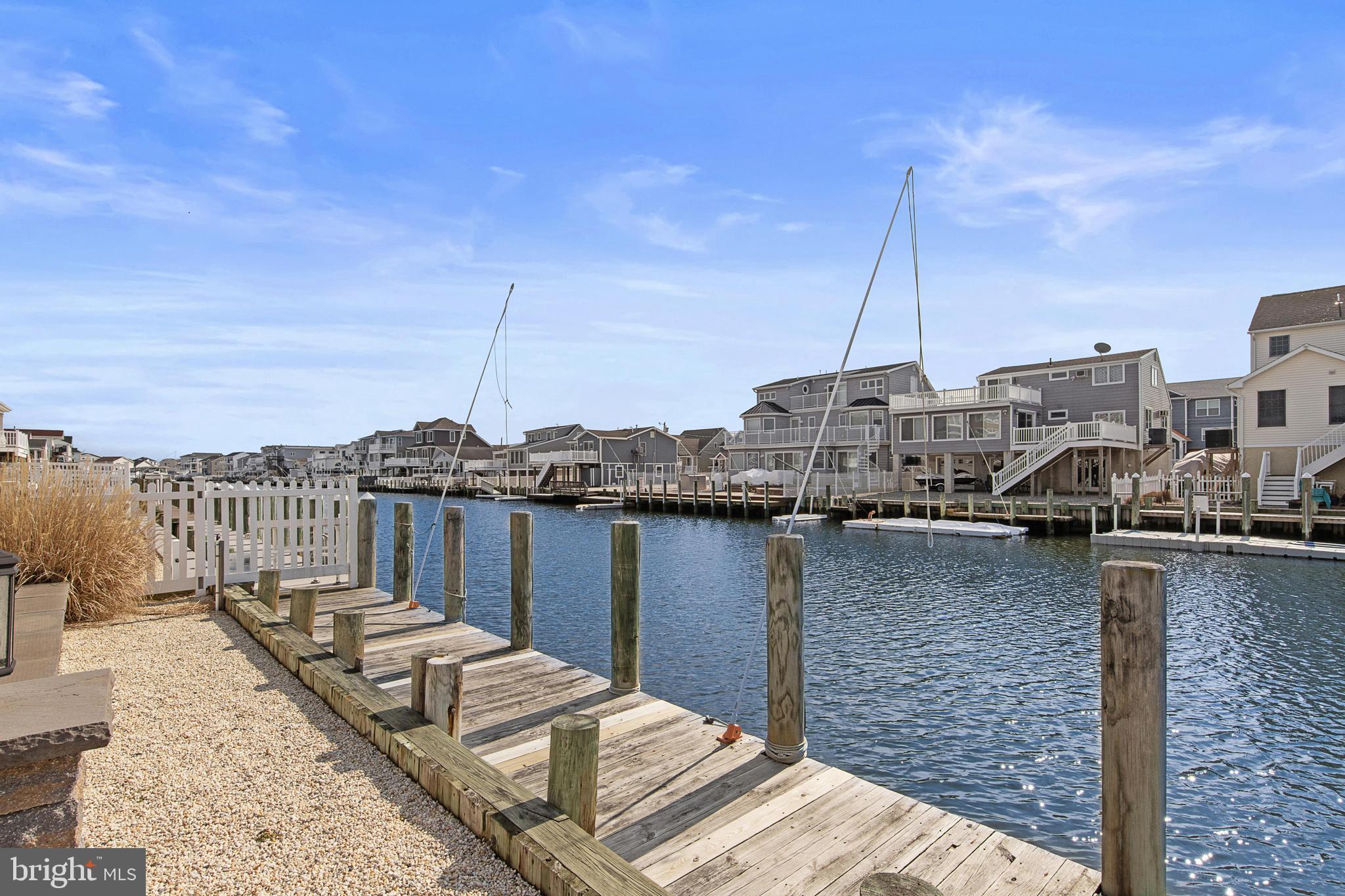 304 Morris Boulevard Manahawkin, NJ 08050 - Photo 53 of 55 a view of a lake and tall buildings