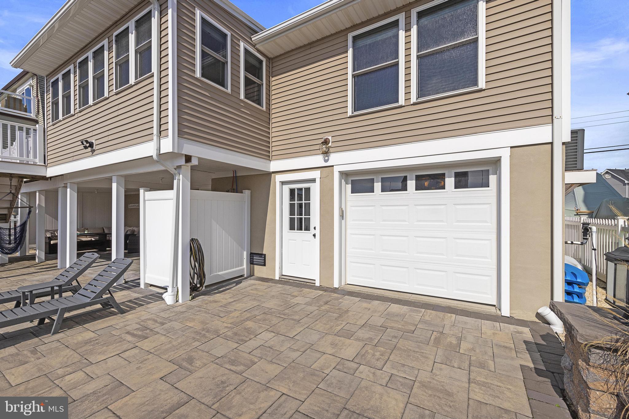 304 Morris Boulevard Manahawkin, NJ 08050 - Photo 54 of 55 a view of a house with large windows