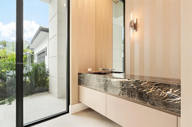 a view of an empty room with a balcony