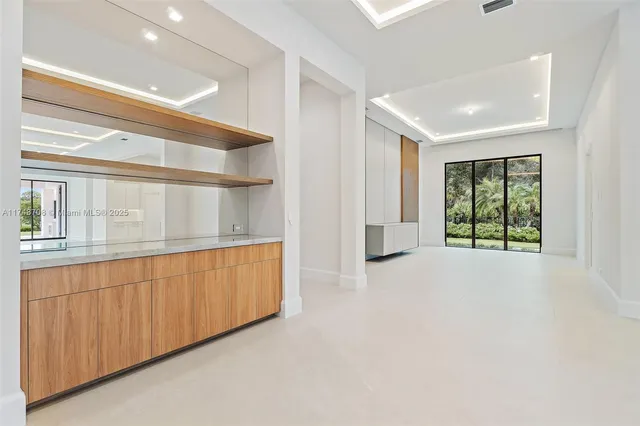 a view of a hallway with a white walls