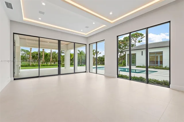 a bathroom with a double vanity sink mirror and shower