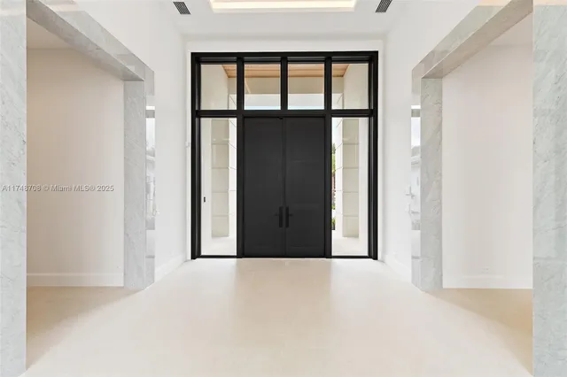 a view of a room with a large window