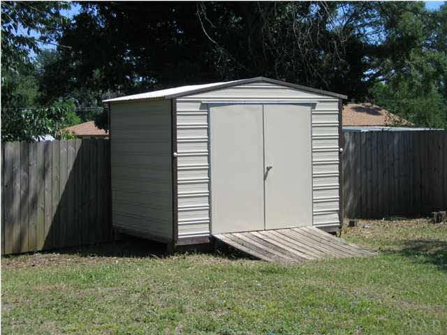 5463 Mulat Road Milton, FL 32583 - Photo 14 of 16 Small storage shed.