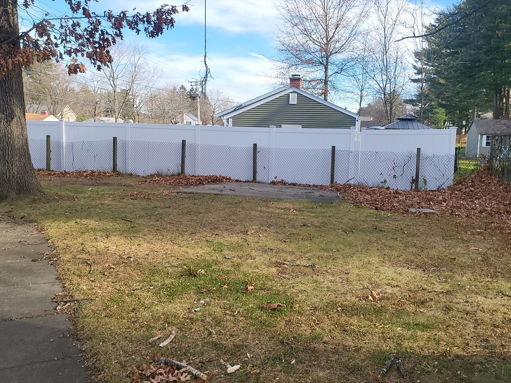 665 Parker Street Springfield, MA 01129 - Photo 17 of 25 a view of a backyard of the house