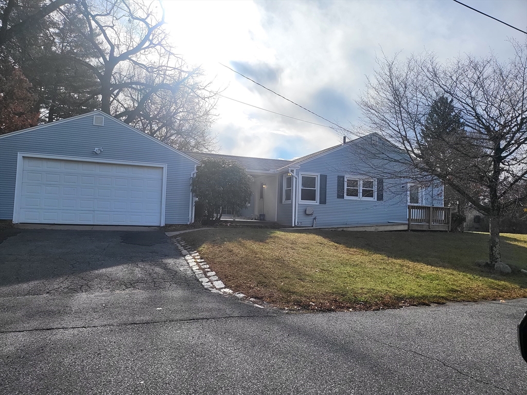 665 Parker Street Springfield, MA 01129 - Photo 23 of 25 a view of a house with a yard