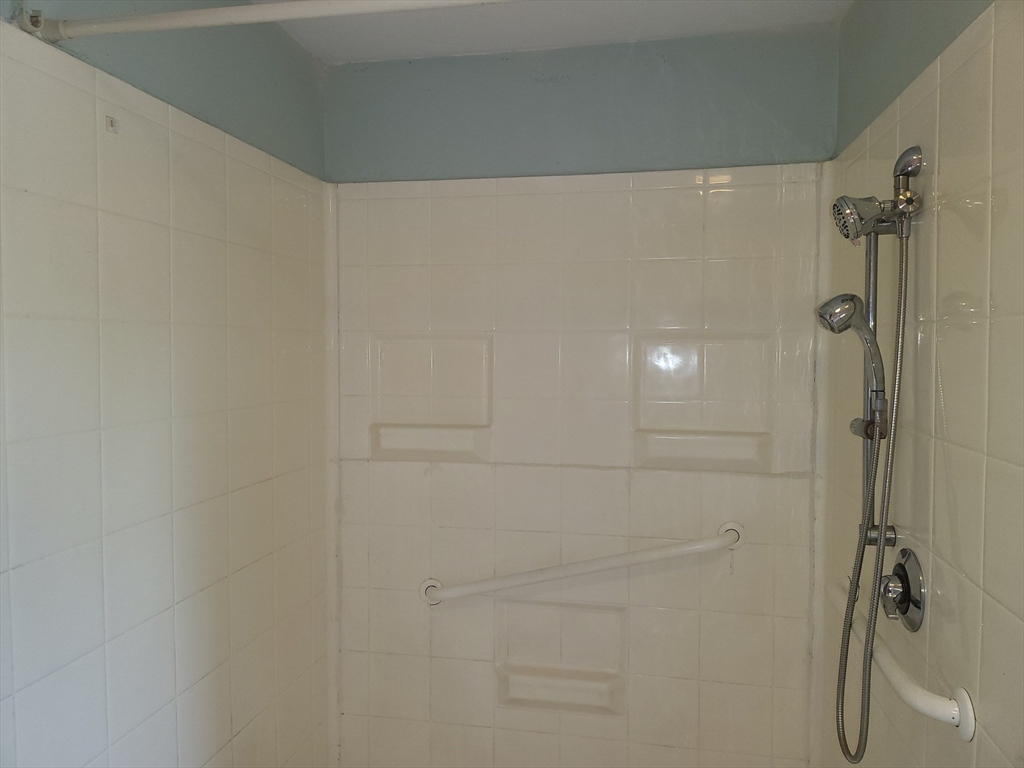 665 Parker Street Springfield, MA 01129 - Photo 7 of 25 a bathroom with a shower