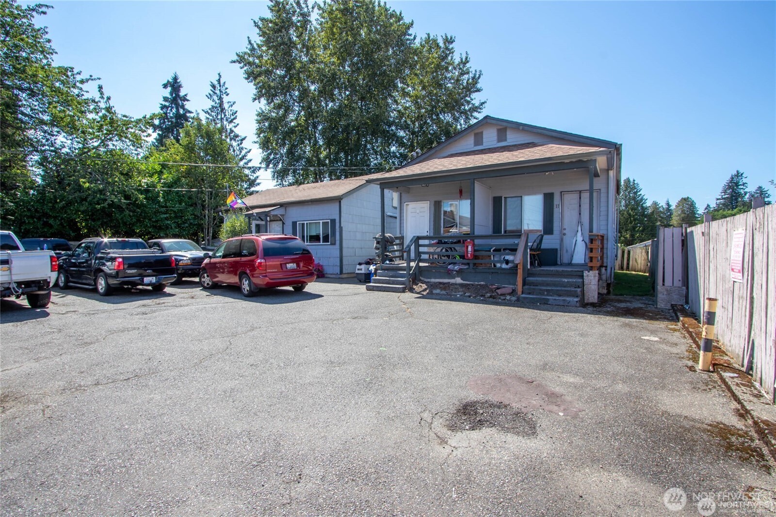 9618 Pacific Avenue Tacoma, WA 98444 - Photo 13 of 14 a car parked in front of house