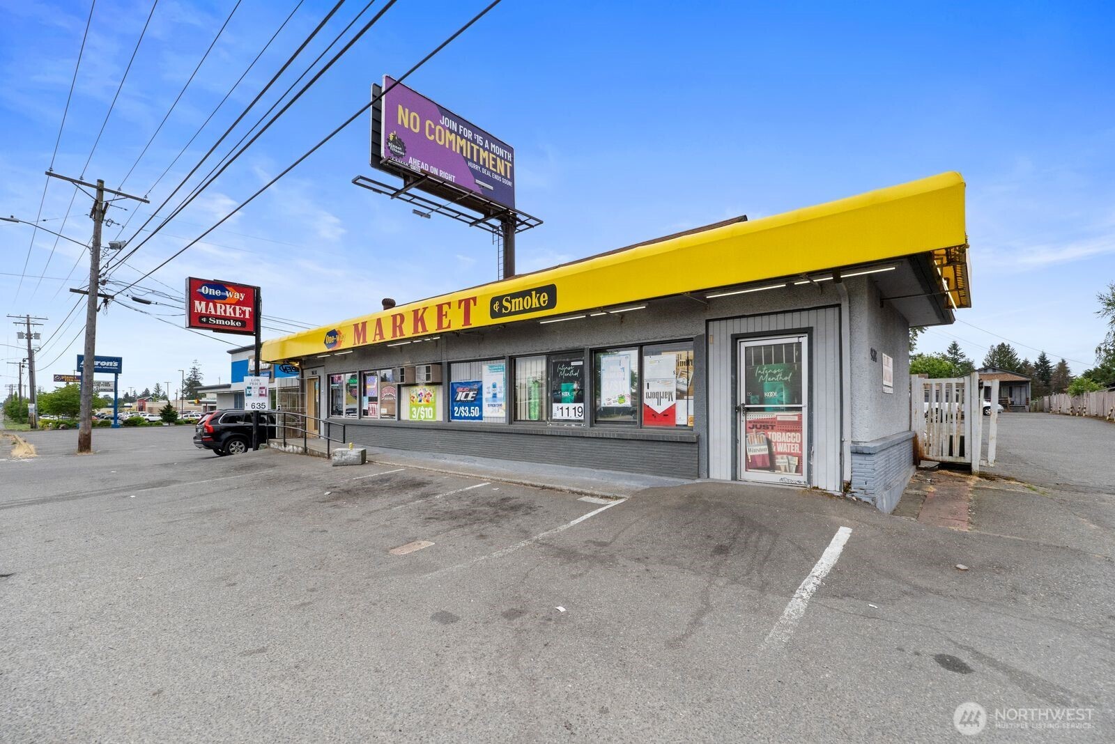 9618 Pacific Avenue Tacoma, WA 98444 - Photo 2 of 14 a view of a house with a street