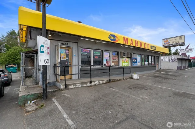 a view of a house with parking area